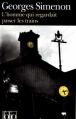 Couverture L'Homme qui regardait passer les trains Editions Folio  (Policier) 2003
