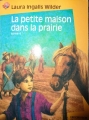 Couverture La petite maison dans la prairie, tome 4 : Un enfant de la terre Editions Flammarion (Castor poche) 2000