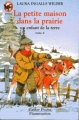 Couverture La petite maison dans la prairie, tome 4 : Un enfant de la terre Editions Flammarion (Castor poche - Junior) 1995