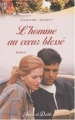 Couverture L'homme au coeur blessé Editions J'ai Lu (Amour et destin) 2002
