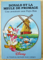 Couverture Donald et la meule de fromage : Une aventure aux Pays-Bas. Editions Hachette (Le tour du monde avec Disney) 1993