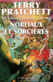 Couverture Les Annales du Disque-Monde, tome 14 : Nobliaux et sorcières Editions L'Atalante (La Dentelle du cygne) 2013