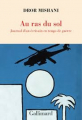 Couverture Au ras du sol - Journal d'un écrivain en temps de guerre Editions Gallimard  2025
