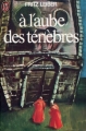 Couverture À l'aube des ténèbres Editions J'ai Lu 1976